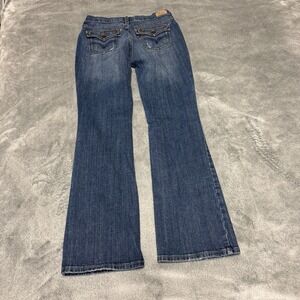 Levis 515 Womens Jeans Size 6M Blue Boot Cut Riveted Button Flap Pockets Red Tab
